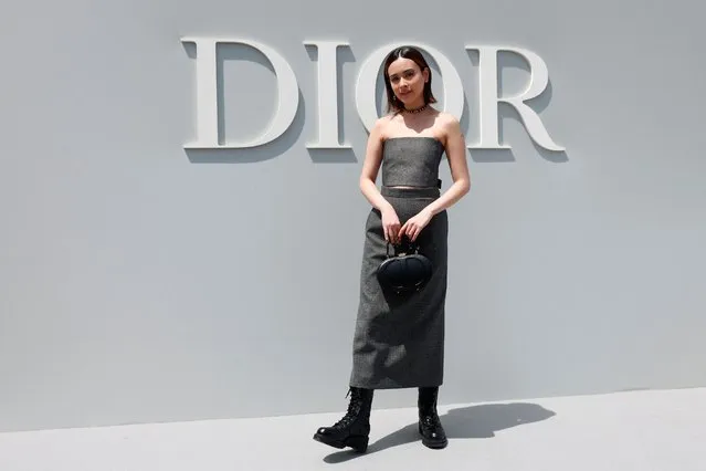 Jun Takahashi's daughter Lala Takahashi poses during a photocall before Kim Jones Menswear ready-to-wear Spring/Summer 2024 collection show for fashion house Dior Homme during Men's Fashion Week in Paris, France on June 23, 2023. (Photo by Gonzalo Fuentes/Reuters)