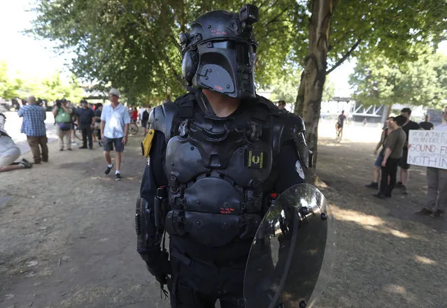 A right-wing supporter of the Patriot Prayer group wears protective gear during a rally in Portland, Ore., August  4, 2018. (Photo by Jim Urquhart/Reuters)