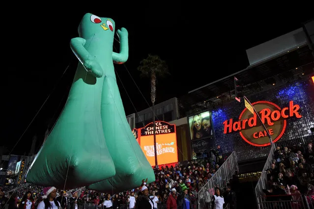 A large inflatable Gumbie character is pulled along in the 85th annual Hollywood Christmas Parade in Los Angeles, California, U.S. November 27, 2016. (Photo by Phil McCarten/Reuters)