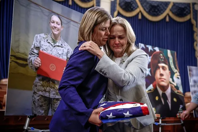 U.S. Representative Madeleine Dean (D-PA) hugs Christy Shamblin, mother-in-law of Marine Corps Sergeant Nicole L. Gee, who was killed in Afghanistan, following “A Gold Star Families Roundtable: Examining the Abbey Gate Terrorist Attack” regarding an attack in Afghanistan, before the House Foreign Affairs Committee on Capitol Hill in Washington, U.S., August 29, 2023. (Photo by Evelyn Hockstein/Reuters)