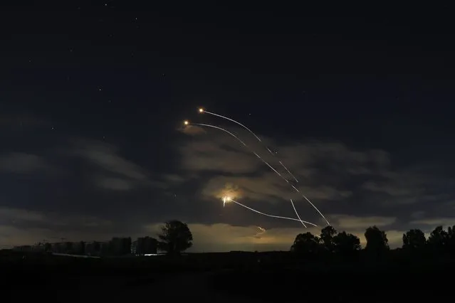 Israeli Iron Dome air defense system launches to intercept rockets fired from Gaza Strip, near Sderot, Israel, Thursday, May 13, 2021. (Photo by Ariel Schalit/AP Photo)