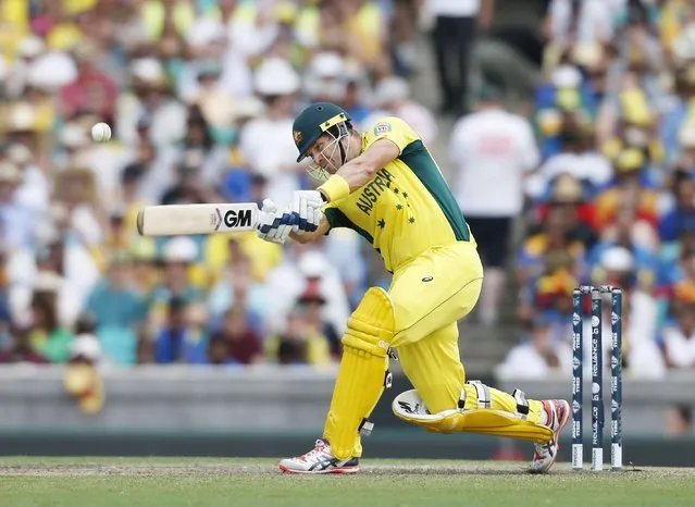 Australia's Shane Watson hits a six during their Cricket World Cup match against Sri Lanka in Sydney, March 8, 2015.    REUTERS/Jason Reed (AUSTRALIA - Tags: SPORT CRICKET)