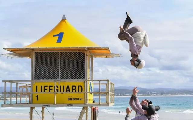 Acrobats from Australia's internationally acclaimed circus ensemble Circa, rehearse on Rainbow Bay beach on June 23, 2021 in Gold Coast, Australia. The group is preparing for the UK premiere season of Shaun the Sheep's Circus Show in 2022, a collaboration with the UK's Academy Award-winning studio Aardman which forms part of the UK/Australia Season 2021-2022, a major new cultural exchange between the two nations. (Photo by James D. Morgan/Getty Images for Australian High Commission to the UK/The British Council Australia)