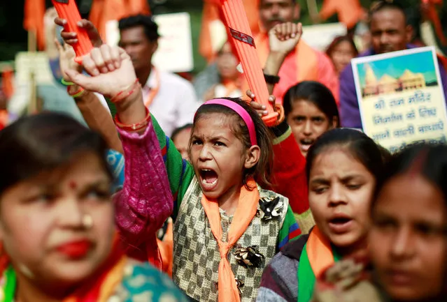 People shout slogans during a demonstration organised by the Hindu hardline group “United Hindu Front” to mark the 26th anniversary of the razing of a 16th century Babri mosque by a Hindu mob in the town of Ayodhya, in New Delhi, December 6, 2018. (Photo by Adnan Abidi/Reuters)