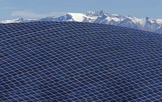 A general view shows solar panels to produce renewable energy at the photovoltaic park in Les Mees, in the department of Alpes-de-Haute-Provence, southern France March 31, 2015. (Photo by Jean-Paul Pelissier/Reuters)