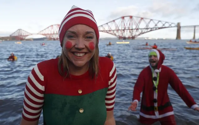 Swimmers in fancy dress participate in the New Year's Day Loony Dook swim at South Queensferry in Scotland, Britain, January 1, 2017. (Photo by Russell Cheyne/Reuters)