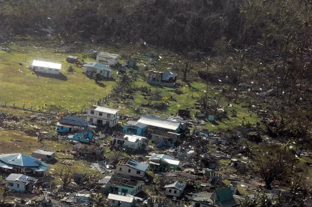 A remote Fijian village is photographed from the air during a surveillance flight conducted by the New Zealand Defence Force on February 21, 2016. Fiji began a massive cleanup on Monday after one of the most powerful storms recorded in the southern hemisphere tore through the Pacific island nation, flattening remote villages, cutting off communications and killing at least 10 people. (Photo by Reuters/NZ Defence Force)