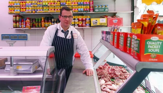 James Casserly, 41, poses for a photograph at his workplace, Harte's Irish Meat Market, in the London constituency of Brent Central, Britain, April 13, 2015. Casserly was born in England and has Irish parents, he said: “I've no particular party, I think they're all the same. The Tories have done alright the last five years considering what they were left with and the fact that it's a coalition”. (Photo by Eddie Keogh/Reuters)