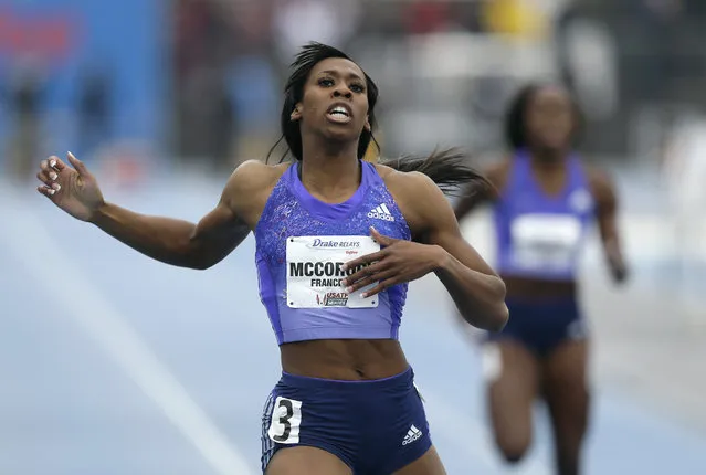 Francena McCorory crosses the finish line as she wins the women's special 400-meter dash at the Drake Relays athletics meet, Saturday, April 25, 2015, in Des Moines, Iowa. (Photo by Charlie Neibergall/AP Photo)