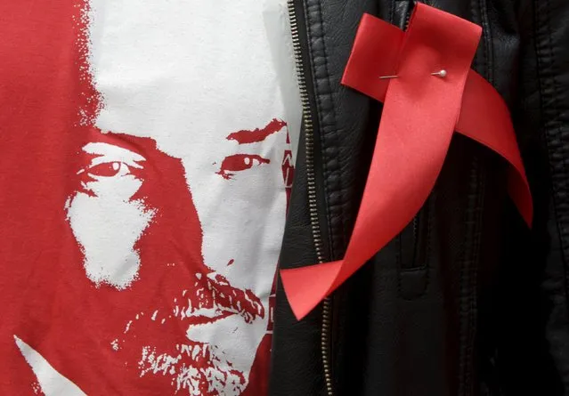 A supporter of Russia's Communist party wears a t-shirt with an image of Soviet state founder Vladimir Lenin during a May Day rally in central Stavropol May 1, 2015. (Photo by Eduard Korniyenko/Reuters)