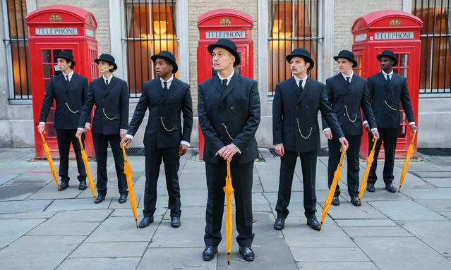 Actors dressed as spies, from the early 1900s, in 3-piece suits and bowler hats, visit Covent Garden during a tour of London landmarks to celebrate the world premiere of “The King's Man“ on Monday, December 6, 2021. “The King's Man”, which is set on the brink of the first World War is a prequel to 'Kingsman: Secret Service', and opens in cinemas nationwide from December 26. (Photo by PinPep/Ben Queenborough/Rex Features/Shutterstock)