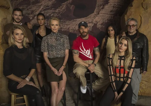 Director George Miller (R) poses with cast members (from L-R) Nicholas Hoult, Rosie Huntington-Whiteley, Courtney Eaton, Charlize Theron, Tom Hardy, Zoe Kravitz and Abbey Lee during a press day for “Mad Max: Fury Road” in Los Angeles, California May 2, 2015. (Photo by Mario Anzuoni/Reuters)