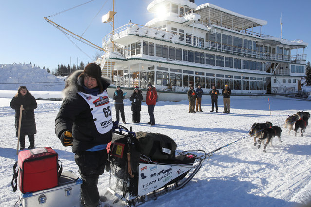 John Baker competes in the official restart of the Iditarod, a nearly 1,000 mile (1,610 km) sled dog race across the Alaskan wilderness, in Fairbanks, Alaska, U.S. March 6, 2017. (Photo by Nathaniel Wilder/Reuters)