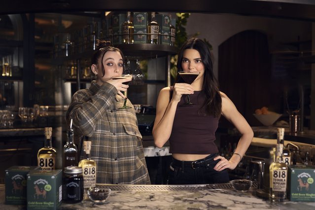 American model Kendall Jenner (R) and American YouTuber Emma Chamberlain in the last decade of April 2024 serve up espresso martinis to celebrate the release of their limited-edition 818 Tequila and Chamberlain Coffee espresso martini kit. (Photo by Nick Wiesner for 818 Tequila)