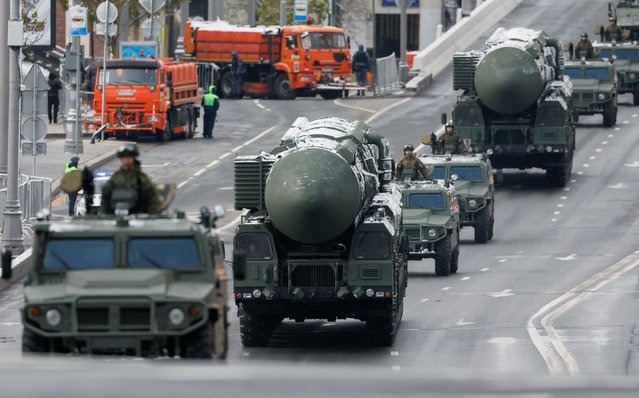 Russian military vehicles, including Yars intercontinental ballistic missile system units, drive along a road before a military parade on Victory Day, which marks the 79th anniversary of the victory over Nazi Germany in World War Two, in Moscow, Russia, on May 9, 2024. (Photo by Shamil Zhumatov/Reuters)