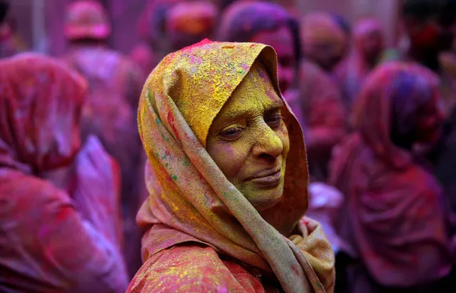 Widows take part in Holi celebrations in the town of Vrindavan in the northern state of Uttar Pradesh, India, March 9, 2017. (Photo by Cathal McNaughton/Reuters)