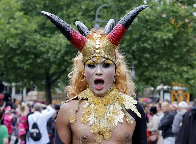 A participant reacts at the annual Christopher Street Day parade on Kurfuerstendamm in Berlin, Germany, June 27, 2015. (Photo by Fabrizio Bensch/Reuters)