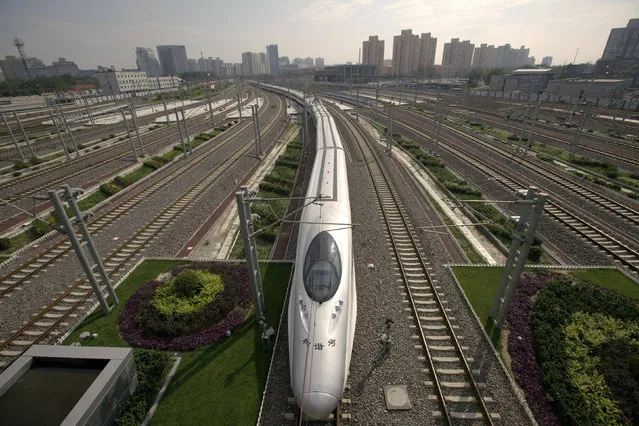 A Harmony bullet train pulls into Beijing South Railway Station Monday, July 25, 2011. (Photo by Jason Lee/Reuters)