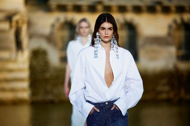 Kaia Gerber presents a creation by designer Pierpaolo Piccioli as part of his Haute Couture Fall/Winter 2023-2024 collection show for fashion house Valentino at the Chateau de Chantilly near Paris, France on July 5, 2023. (Photo by Sarah Meyssonnier/Reuters)