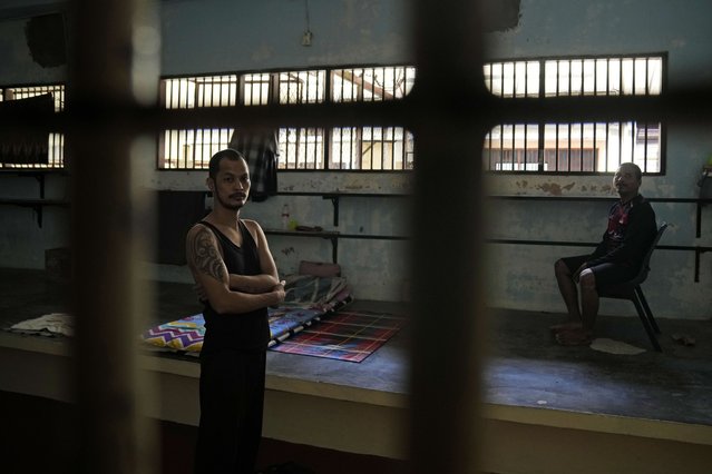 Two of four Myanmarese fishermen, stranded because they cannot afford to pay for their onward travel, rest inside their cell at Tanjungpinang Central Immigration Detention Center on Bintan Island, Indonesia, Wednesday, May 15, 2024. This three-story detention facility, with its barred windows and fading paint, is home to dozens of detainees facing uncertain futures, including whether they will ever return to their homelands, in conditions that closely resemble a prison. (Photo by Dita Alangkara/AP Photo)