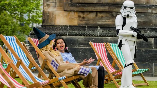 Aditi Jehangir as Dorothy, Ewan Shand as Scarecrow and Brian McDavid as a Stormtrooper, representing Wizard of Oz and Star Wars, two of the popular films lined-up for this year’s Film Fest in the City, perform in St Andrew Square during the Edinburgh Film Festival 2021 on August 19, 2021 in Edinburgh, Scotland. (Photo by Euan Cherry/Getty Images)