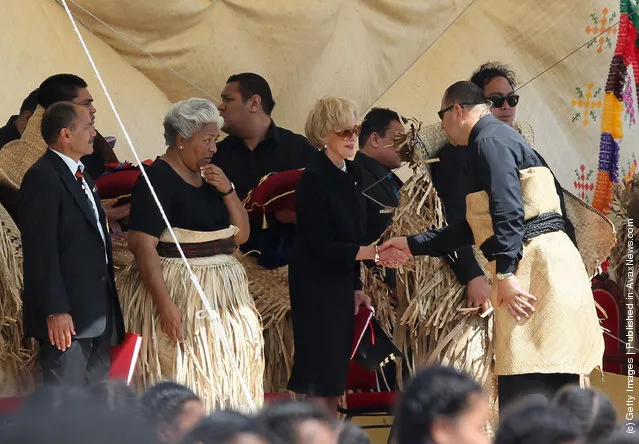 The new King Tupou VI greets the Australian Goveror General Ms Quentin Bryce during the State Funeral held for King George Tupou V at Mala'ekula