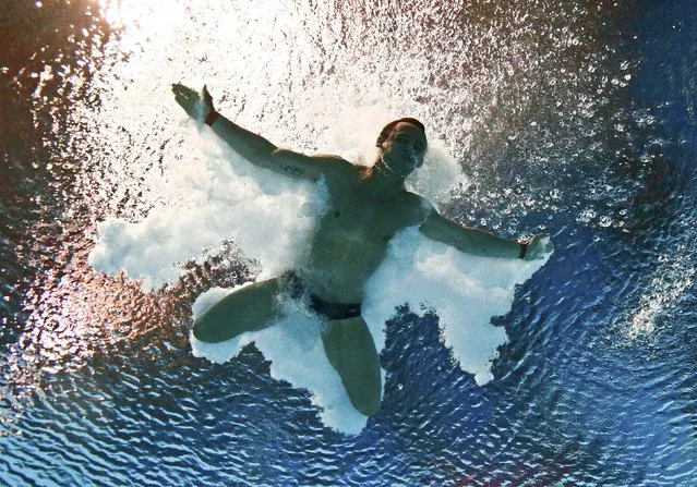 Thomas Daley of Britain is seen underwater during the mixed team event final at the Aquatics World Championships in Kazan, Russia July 29, 2015. (Photo by Stefan Wermuth/Reuters)