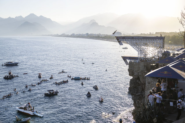 In this handout image provided by Red Bull, Jonathan Paredes of Mexico dives from the 27 metre platform during the second competition day of the seventh stop of the Red Bull Cliff Diving World Series on September 28, 2024 at Antalya, Turkey. (Photo by Dean Treml/Red Bull via Getty Images)