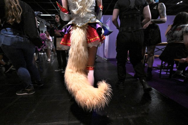 A person wearing a costume walks at the 2023 Gamescom computer and video game industry event in Cologne, Germany on August 24, 2023. (Photo by Jana Rodenbusch/Reuters)/