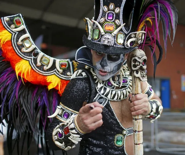 A performer poses for a photograph at the Notting Hill Carnival in west London, August 31, 2015. (Photo by Eddie Keogh/Reuters)