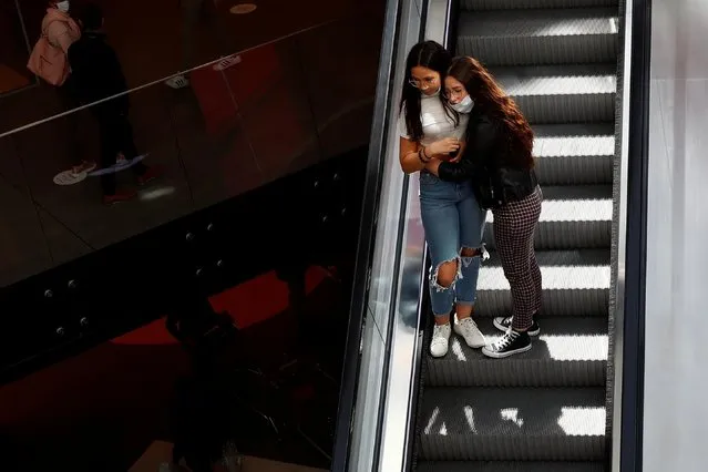 People are seen at a shopping centre as Belgium began easing lockdown restrictions amid the coronavirus disease (COVID-19) outbreak, in Brussels, Belgium on May 11, 2020. (Photo by Francois Lenoir/Reuters)