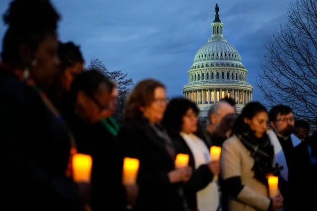 Christian leaders gather for a prayer vigil to mark the second year anniversary of the violent insurrection by supporters of then-President Donald Trump, on Capitol Hill in Washington, Friday, January 6, 2023. (Photo by Matt Rourke/AP Photo)