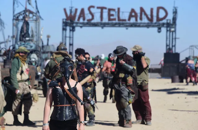 Festival goers attend the first day of Wasteland Weekend in the high desert community of California City in the Mojave Desert, California, where people are gathering for the world's largest post-apocalyptic festival on September 22, 2016. (Photo by Frederic J. Brown/AFP Photo)