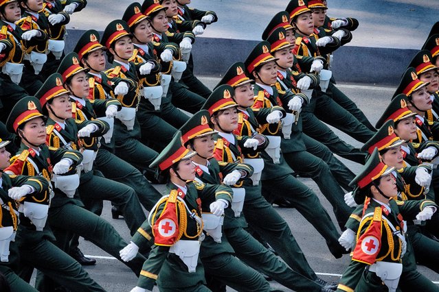 A Vietnamese women's medical unit marches during a military parade celebrating the 50th anniversary of the end of the Vietnam War on Wednesday, April 30, 2025, in Ho Chi Minh City, Vietnam. (Photo by Richard Vogel/AP Photo)