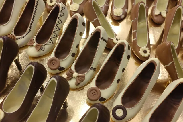 Chocolate shoes are displayed during a show as part of the chocolate fair in Paris, Tuesday, October 27, 2015. (Photo by Jacques Brinon/AP Photo)