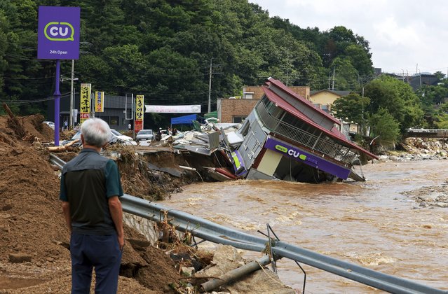 A damaged convenience store building is seen after heavy rains in Gapyeong, South Korea, Sunday, July 20, 2025. (Photo by Lee Young-hwan/Newsis via AP Photo)