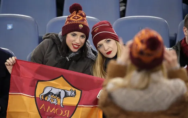 AS Roma's supporters take a picture before the Champions League Group E soccer match against Manchester City at the Olympic stadium in Rome December 10, 2014. (Photo by Max Rossi/Reuters)