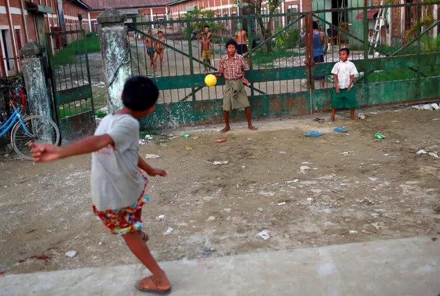 Boys play soccer in Yangon, Myanmar on  October 22, 2015. (Photo by Soe Zeya Tun/Reuters)