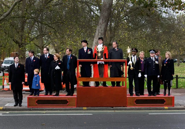 Local dignitaries watch a Remembrance Sunday parade through Fulham in West London, Britain November 9, 2008. (Photo by Kevin Coombs/Reuters)