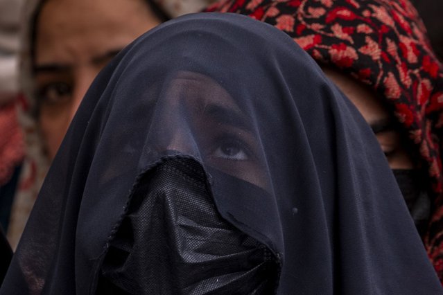 Kashmiri Muslim devotees pray at the Hazratbal shrine on the Friday following Mehraj-u-Alam, believed to mark the ascension of Prophet Muhammad to heaven, on the outskirts of Srinagar, Indian controlled Kashmir, Friday, January 31, 2025. (Photo by Dar Yasin/AP Photo)