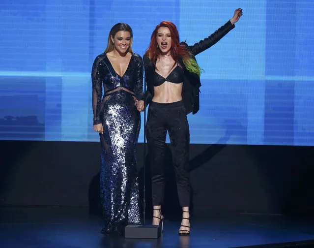 Singer Rachel Platten (L) and actress Bella Thorne introduce a performance on stage at the 2016 American Music Awards in Los Angeles, California, U.S., November 20, 2016. (Photo by Mario Anzuoni/Reuters)