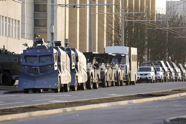 Police water cannons parked in a street to prevent a rally commemorating the founding of Belarus' 1918 proclamation of independence from Russia, in Minsk, Belarus, Thursday, March 25, 2021. Belarusian opposition have urged people to protest against repressions in the country and Lukashenko's regime. (Photo by BelaPan via AP Photo)