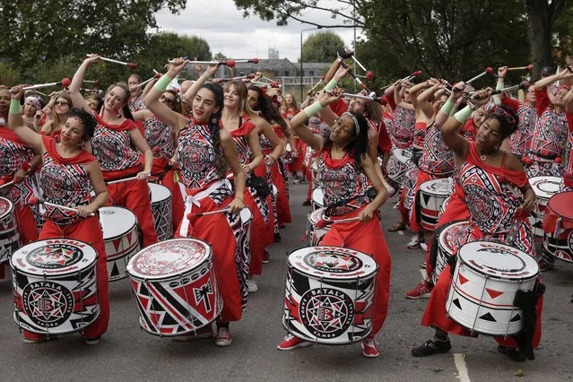 A band practices ahead of the parade during the Notting Hill Carnival in London, Monday, August 27, 2018. (Photo by Tim Ireland/AP Photo)