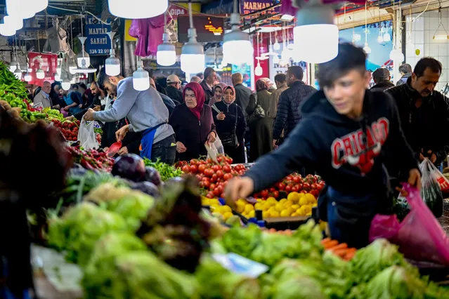 Turkish people do shopping ahead of Eid Al-Fitr at Ulus district in Ankara, Turkiye on April 17, 2023. Muslims around the world celebrate Eid al-Fitr, the three day festival marking the end of the Muslim holy fasting month of Ramadan, which is one of the two major holidays in Islam. (Photo by Mustafa Ciftci/Anadolu Agency via Getty Images)