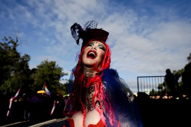A reveller takes part in the “Free Parade” during LGBTIQ Pride Month in Porto Alegre, state of Rio Grande do Sul, Brazil on June 12, 2022. (Photo by Diego Vara/Reuters)