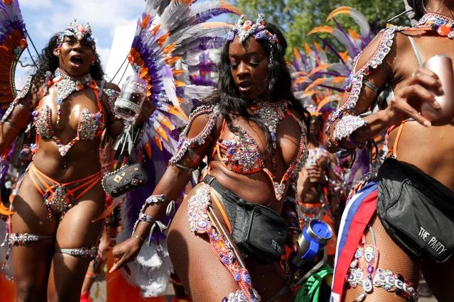 Revellers take part in the Notting Hill Carnival, in London, Britain on August 28, 2023. (Photo by Hollie Adams/Reuters)