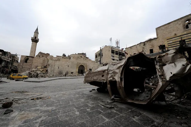 A damaged vehicle is pictured in Khan al-Wazeer street, in the Old City of Aleppo, Syria January 31, 2017. (Photo by Omar Sanadiki/Reuters)