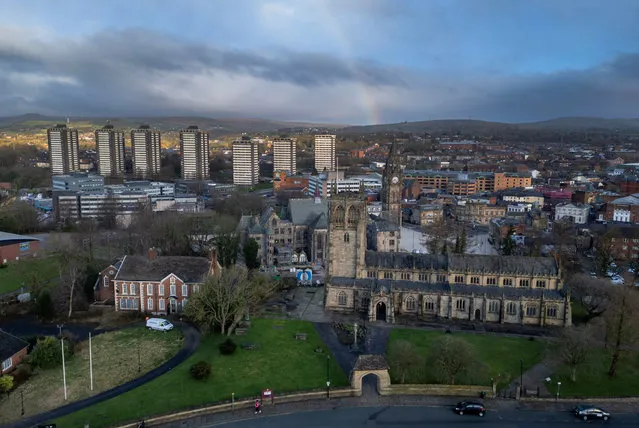 A drone view of a rainbow behind the seven sisters residential tower blocks ahead of the upcoming Parliamentary by-election in Rochdale, Britain, on February 26, 2024. (Photo by Phil Noble/Reuters)