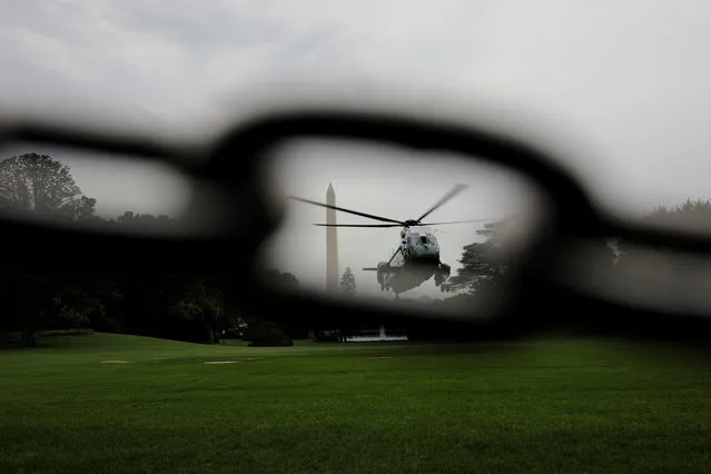 U.S. President Donald Trump arrives aboard the Marine One helicopter as he returns to the White House in Washington, U.S., May 17, 2019. (Photo by Carlos Barria/Reuters)