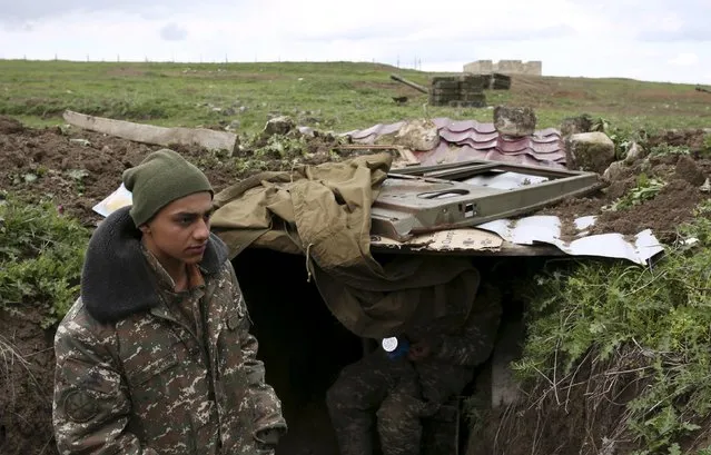 Soldiers of the self-defense army of Nagorno-Karabakh gather at their positions in Martakert province, which according to Armenian media was affected by clashes over the breakaway Nagorno-Karabakh region, April 4, 2016. (Photo by Vahan Stepanyan/Reuters/PAN Photo)